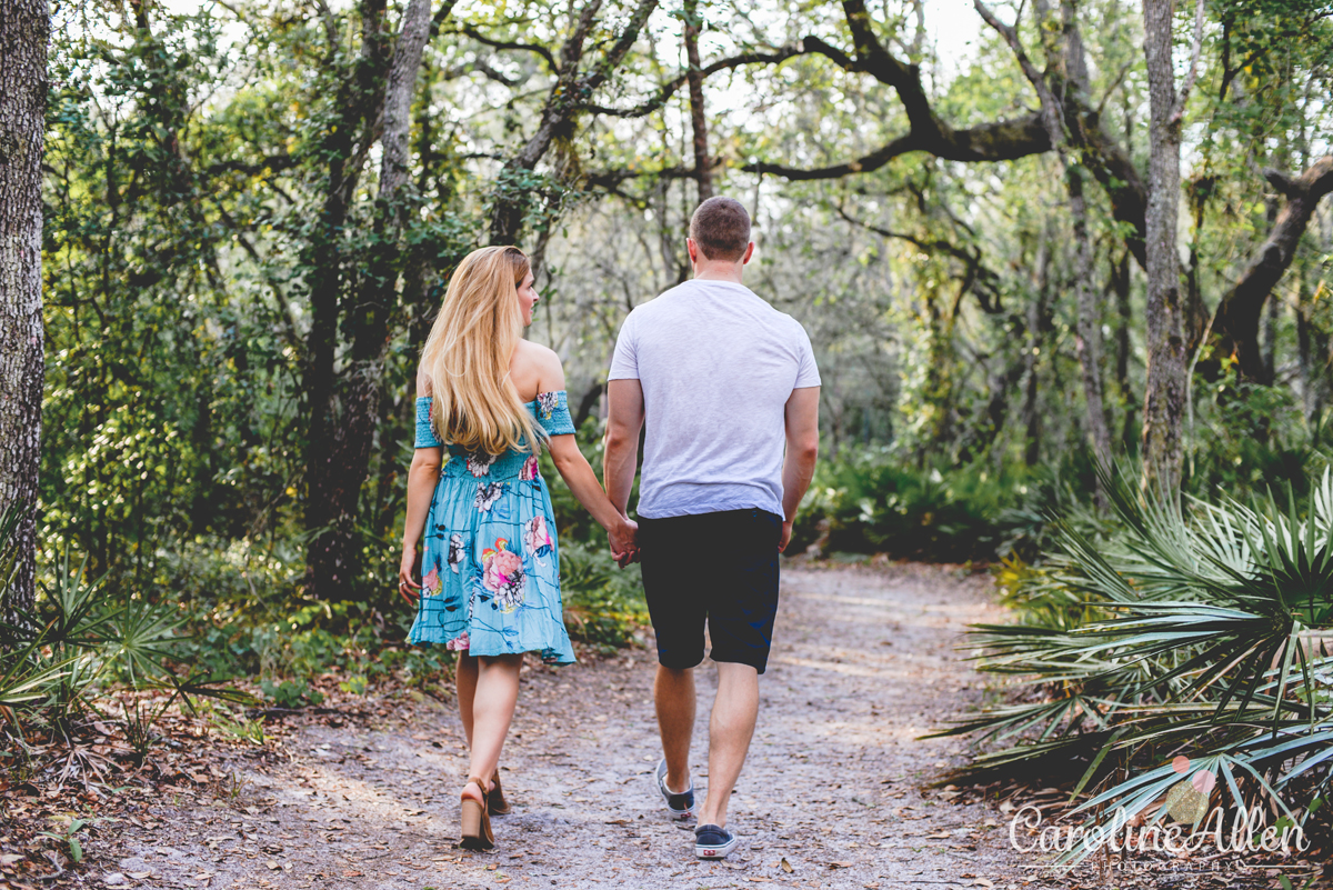 walking, holding hands, blue dress, couple