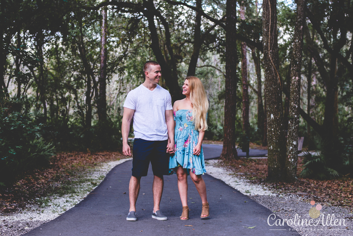 blue dress, sidewalk, forest, dark, couple