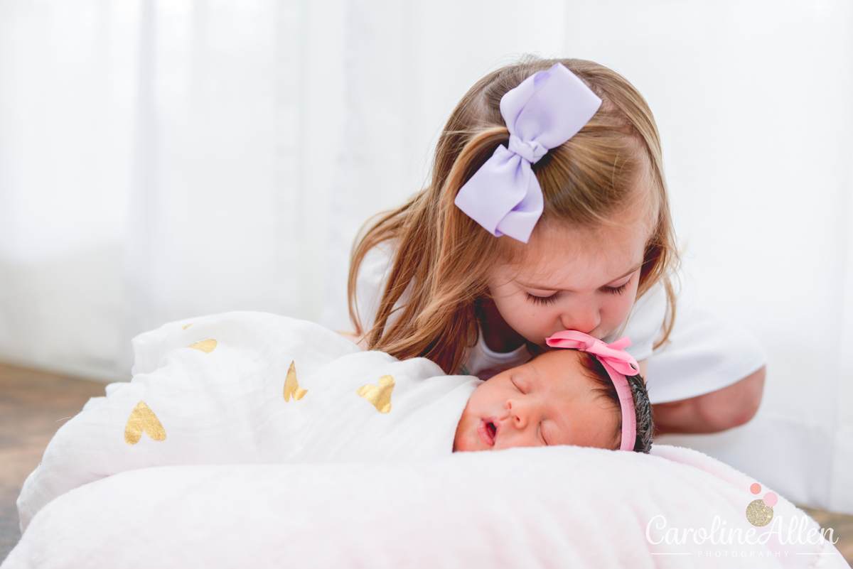 sister, kissing, pink, purple, bow