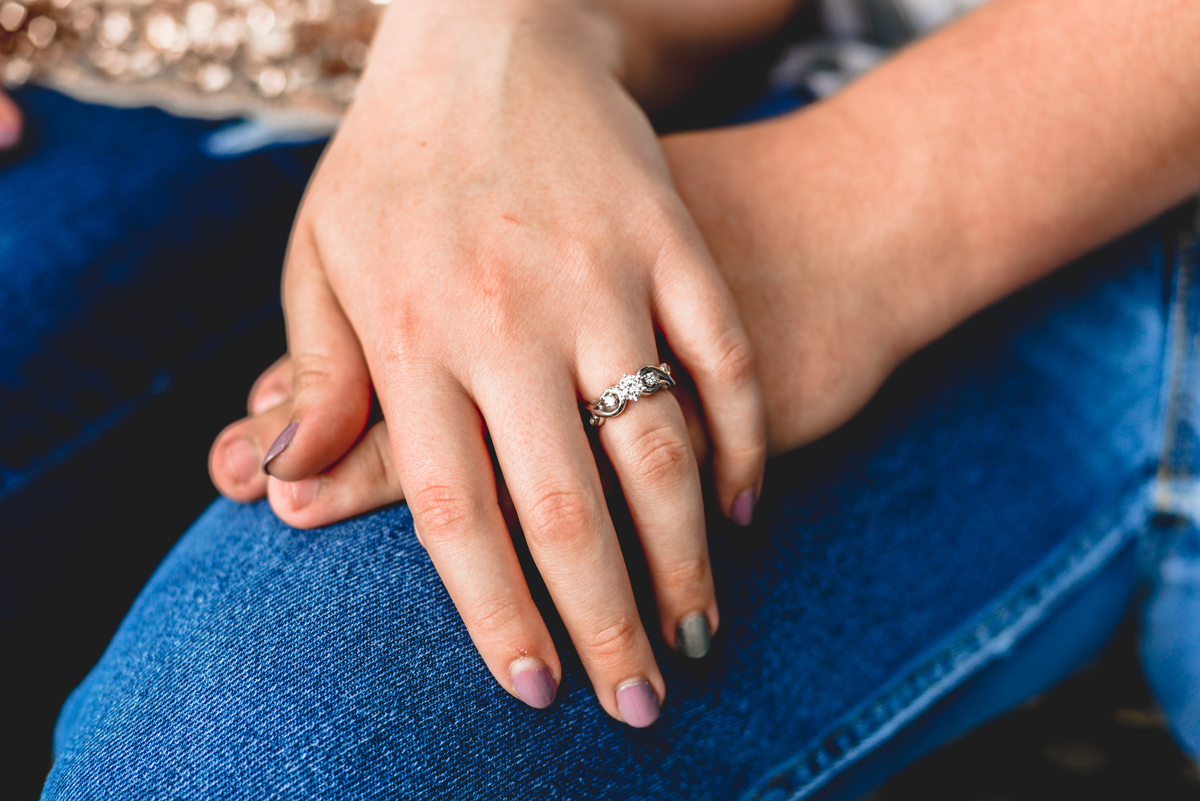 engaged, engagement ring, blue jeans, holding hands