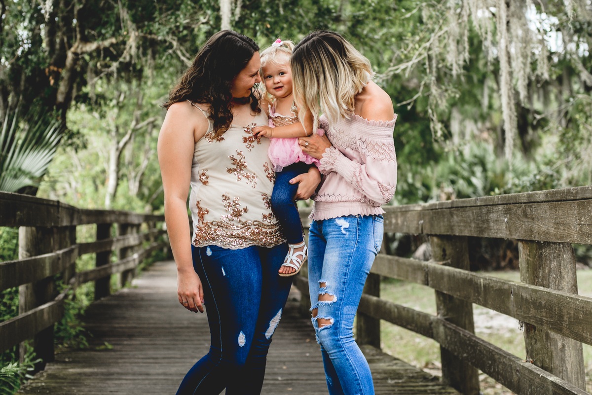 sisters, niece, daughter, boardwalk, trees, moss