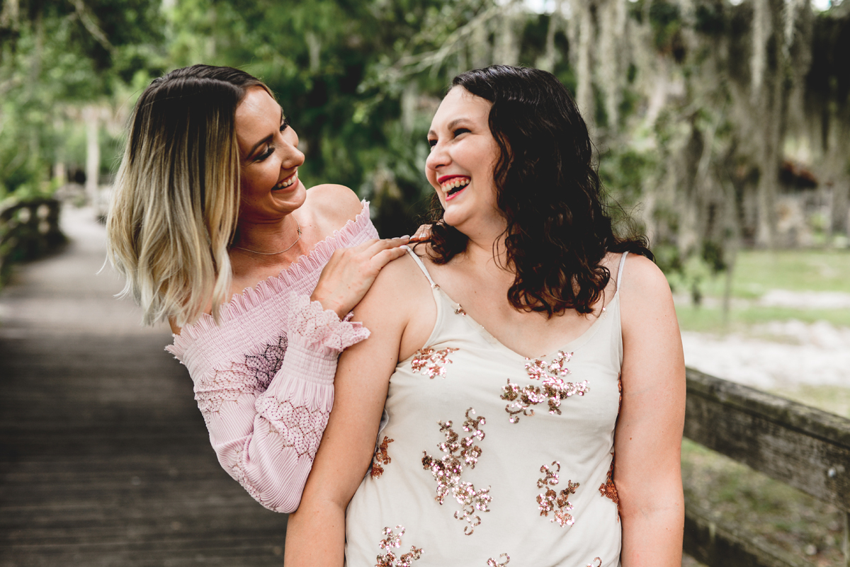 sisters, laughing, family, boardwalk, family, trees