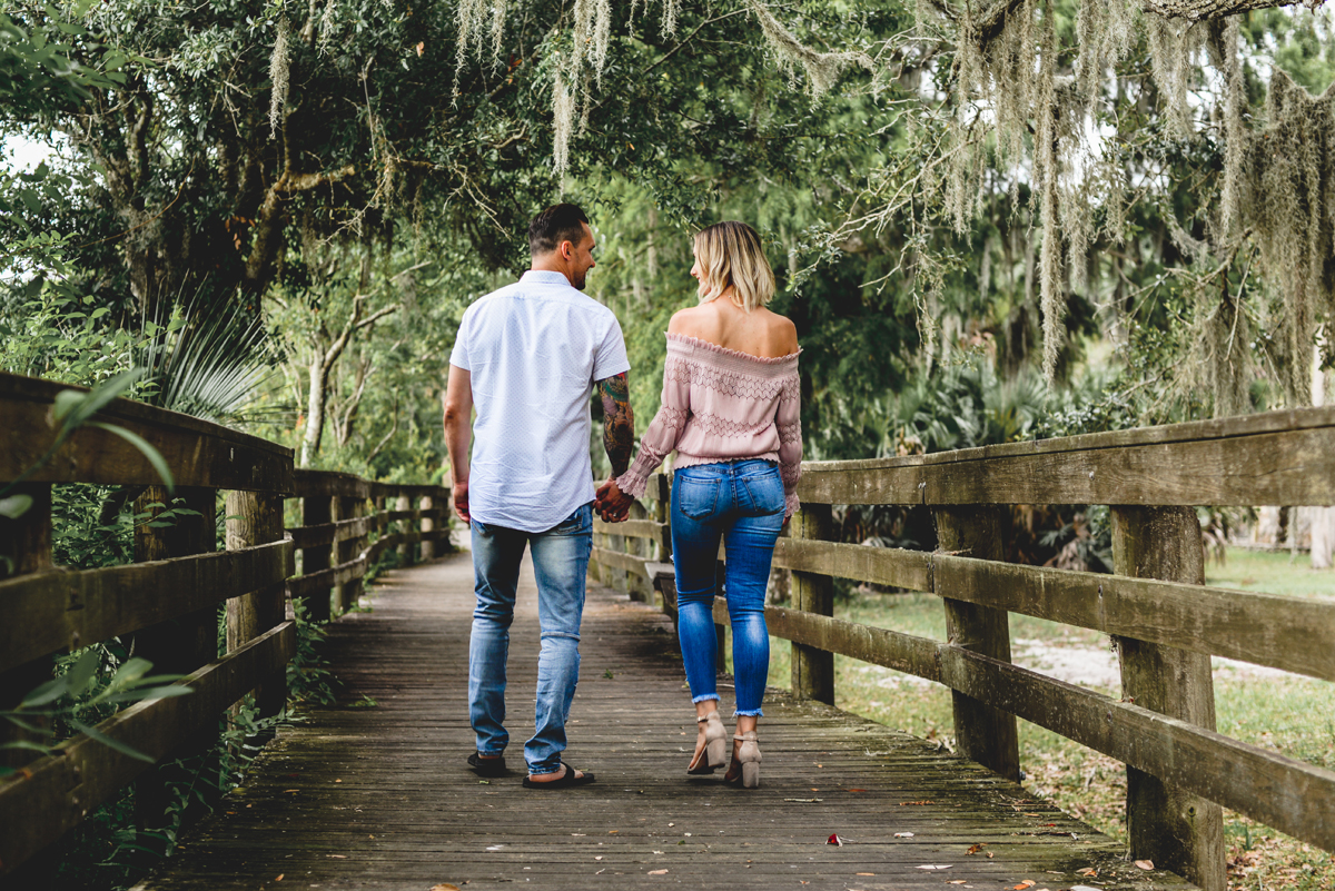 boardwalk, holding hands, husband and wife, moss, trees, nature