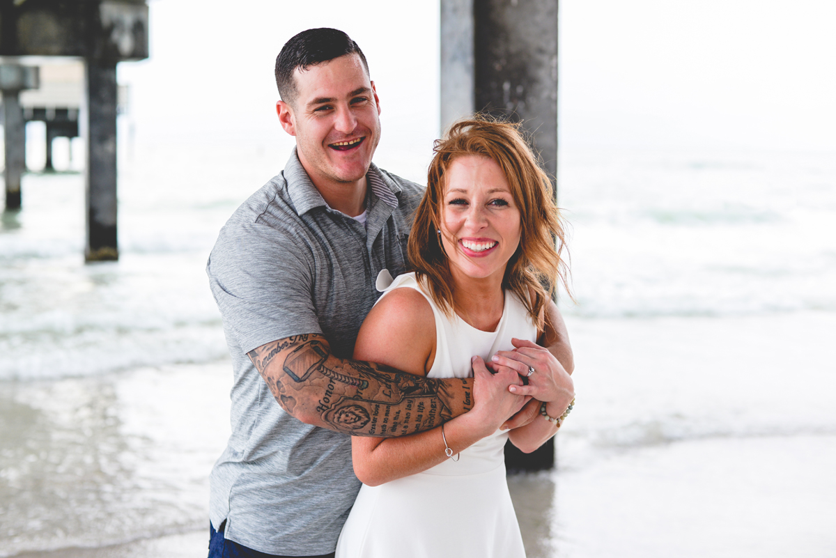 laughing, couple, smiling, pier, beach, ocean, waves