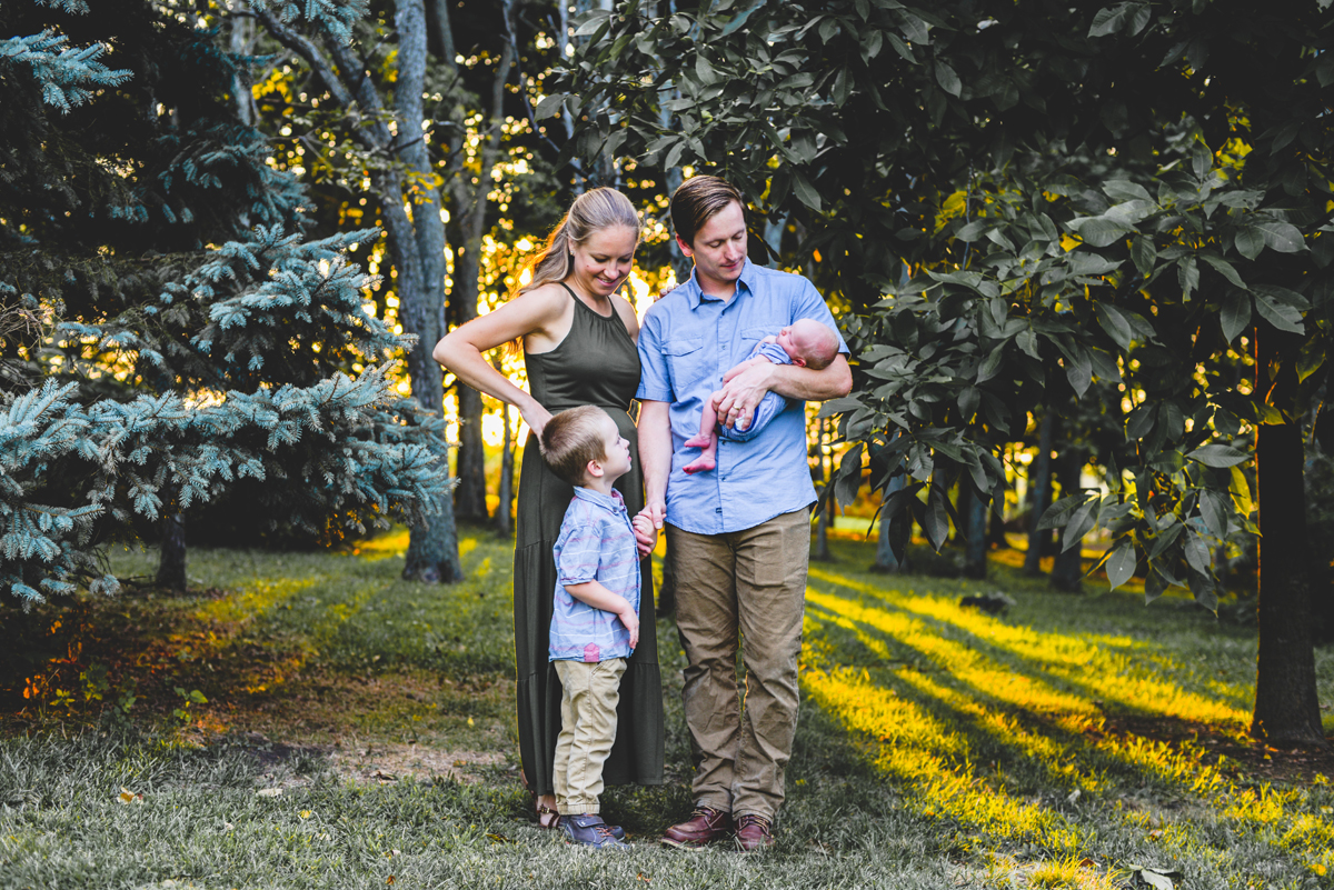 family, forest, trees, sun flare, newborn