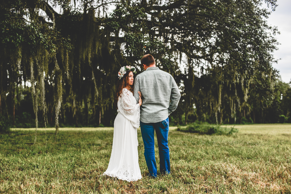 flower crown, moss, tree, couple, grass field, country