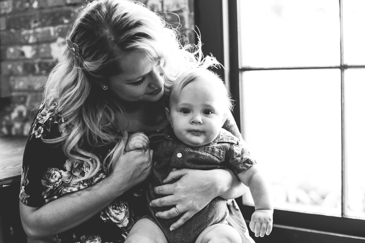 black and white, mom, baby, window, brick