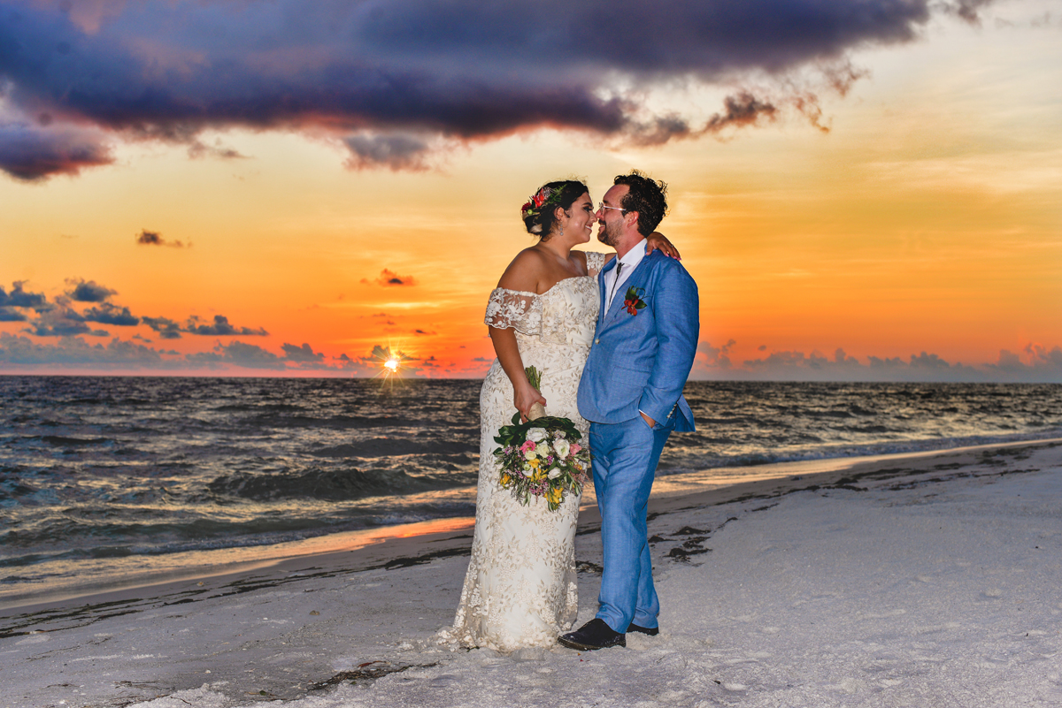 sunset, ocean, beach, wedding, just married, husband, wife