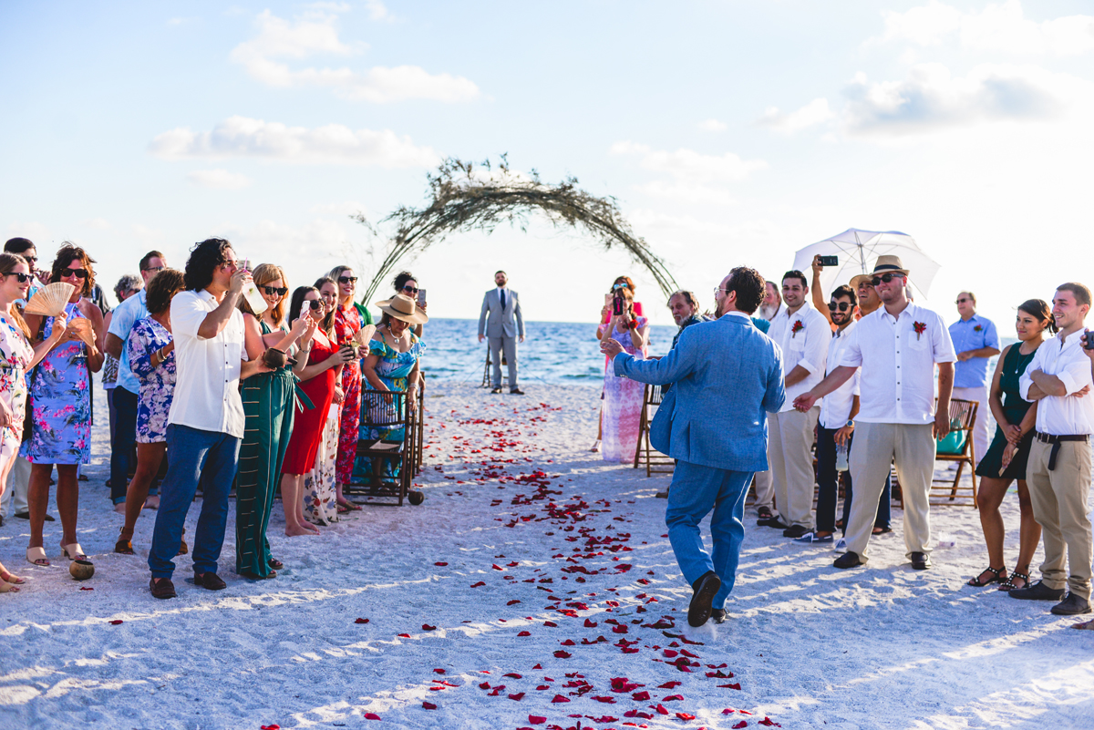 beach, sand, wedding, ocean, groom, rose petals