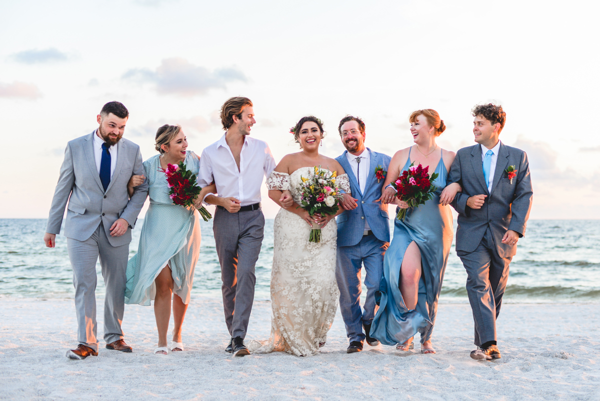 bridal party, walking, laughing, beach, ocean, love