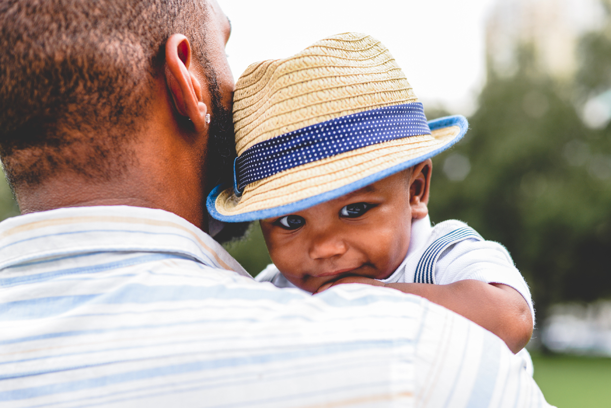 father, son, hat, smiling, peeking, park