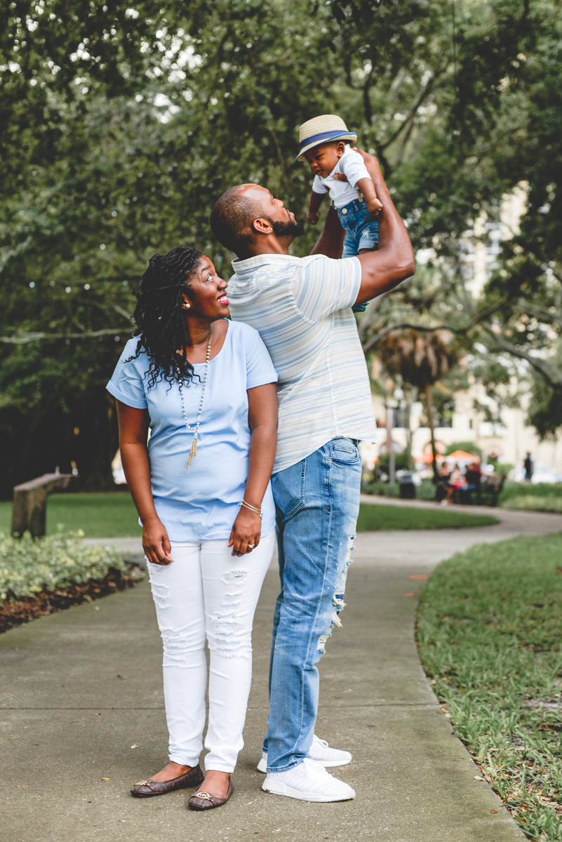 family, baby, playing, park, posing, smile