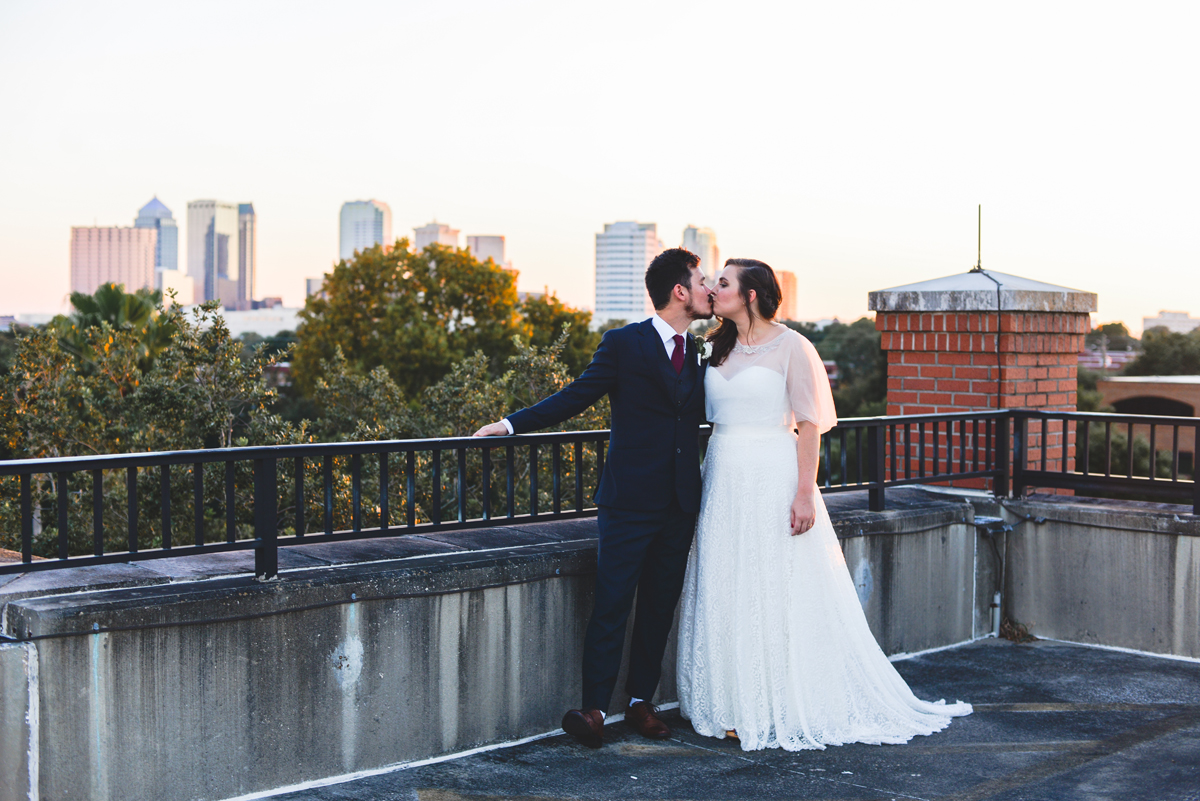 tampa, city, skyline, sunset, husband, wife, wedding day, kissing