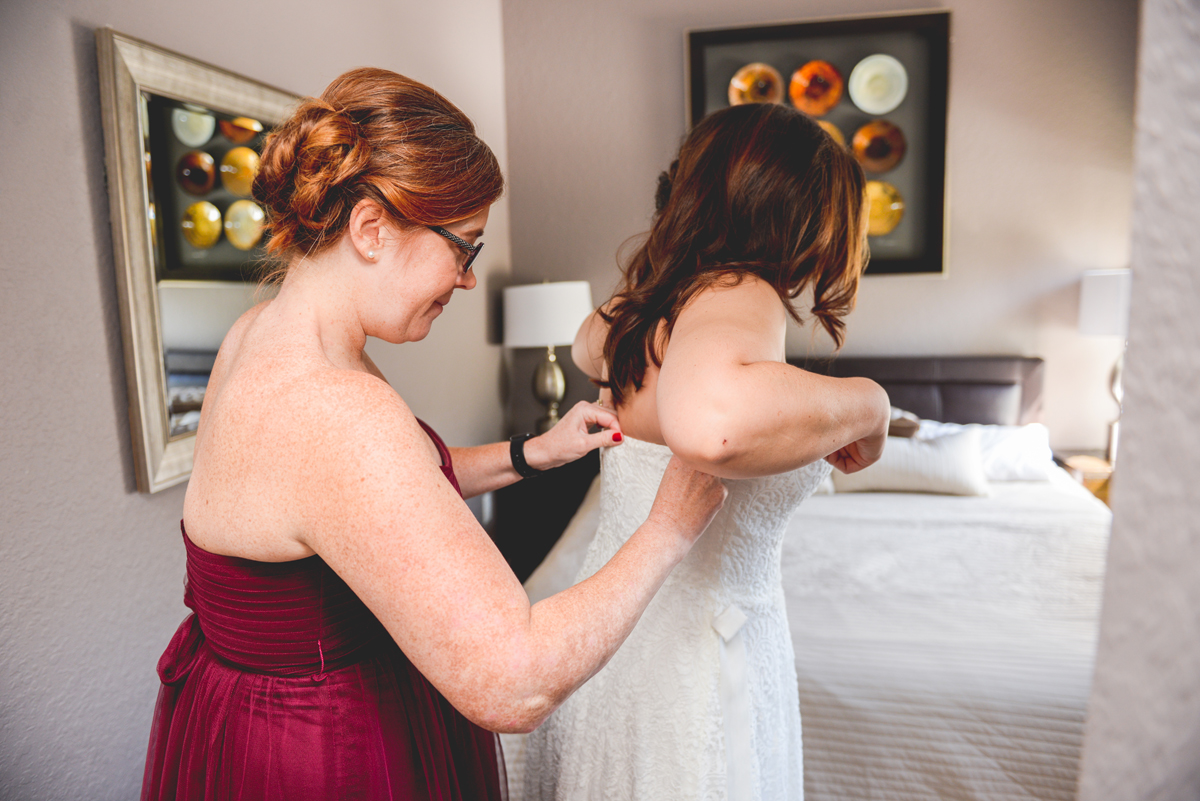 sister, bridesmaid, getting ready, wedding dress