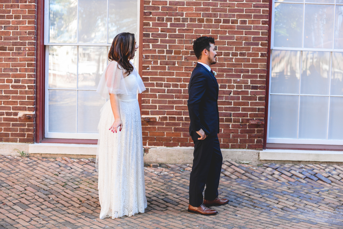 first look, posed, bride, groom, brick, wedding day