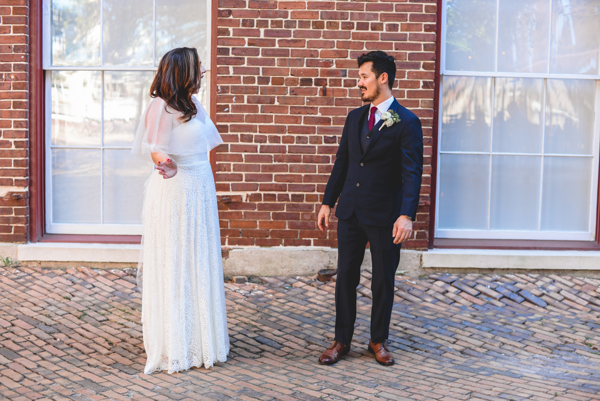 first look, posed, bride, groom, brick, wedding day