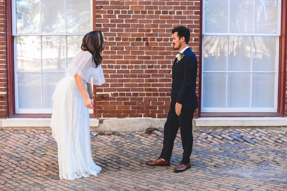 first look, posed, bride, groom, brick, wedding day