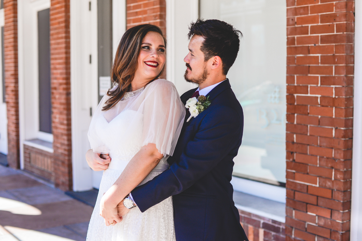 bride, groom, just married, brick, ybor, smiling