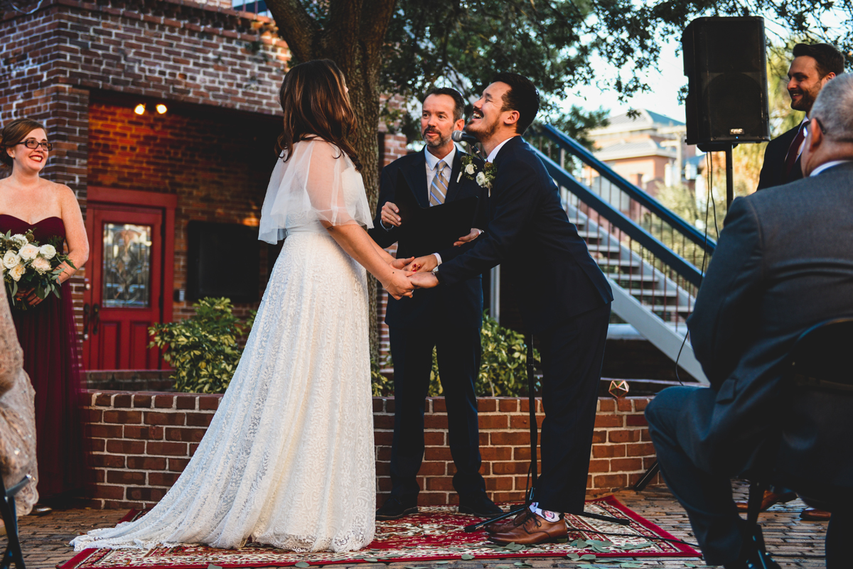 bride, groom, wedding, exchanging vows, laughing, happiness