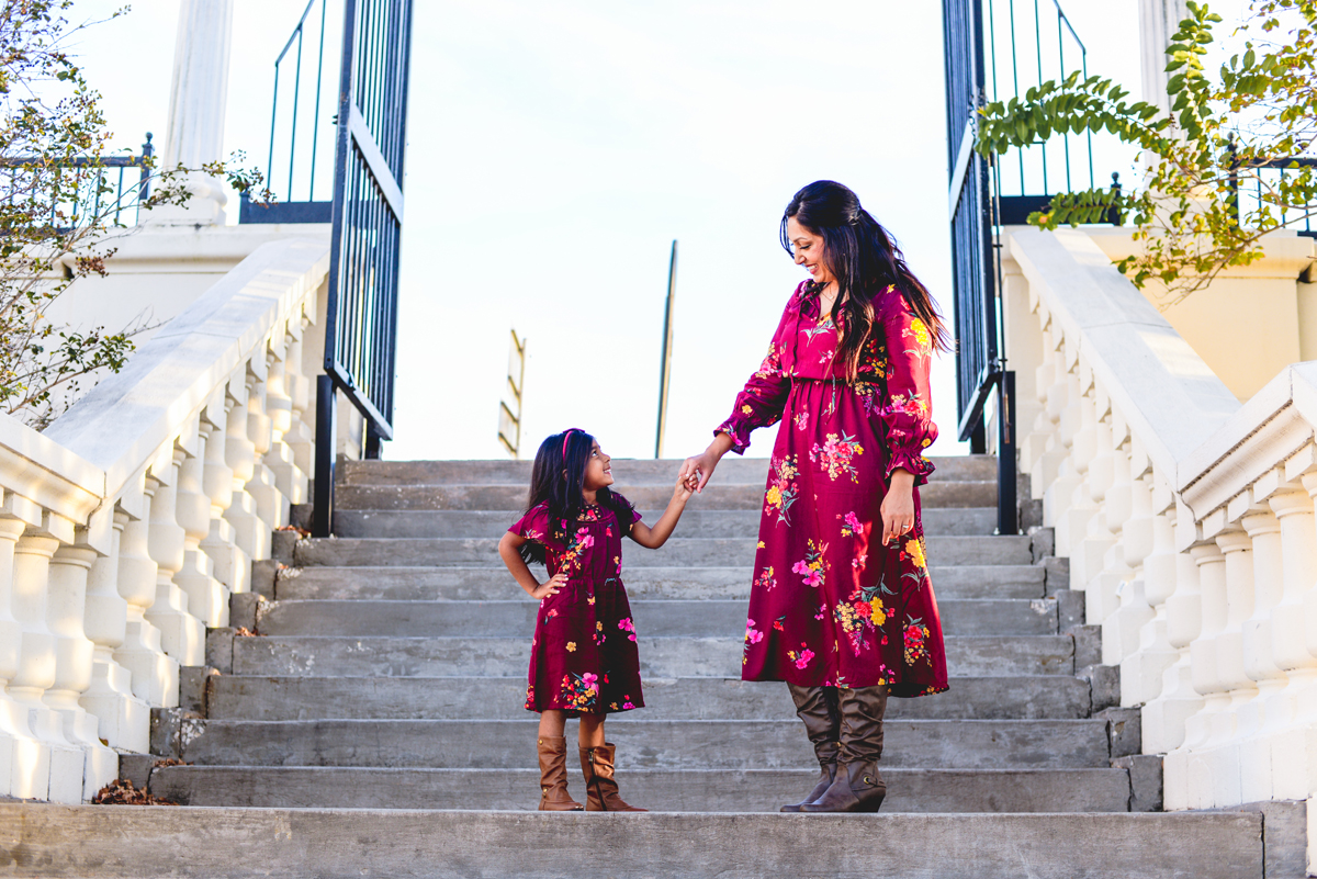 mom, daughter, matching, holding hands, stairs