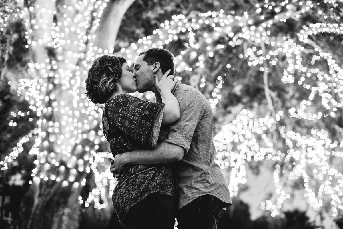 christmas lights, black and white, engagement, dunedin, tree, kissing