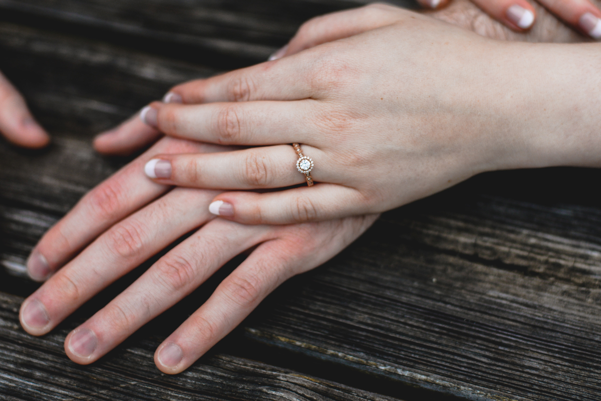 diamond ring, rose gold, holding hands, engaged