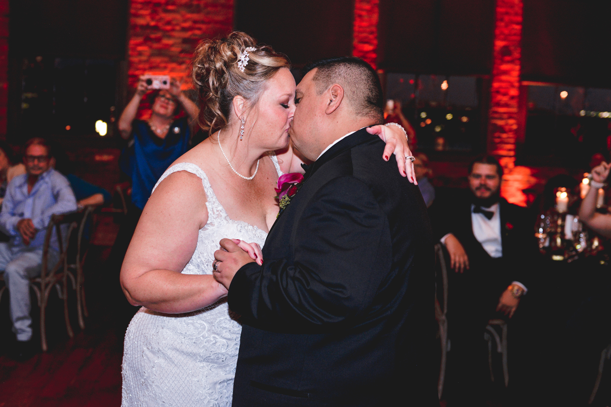 wedding, first dance, bride, groom, just married, kiss