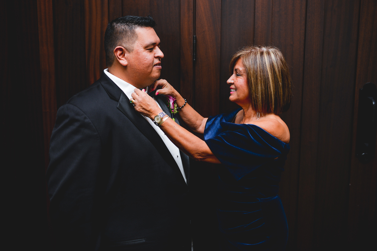 mother, son, wedding day, black tie, getting ready