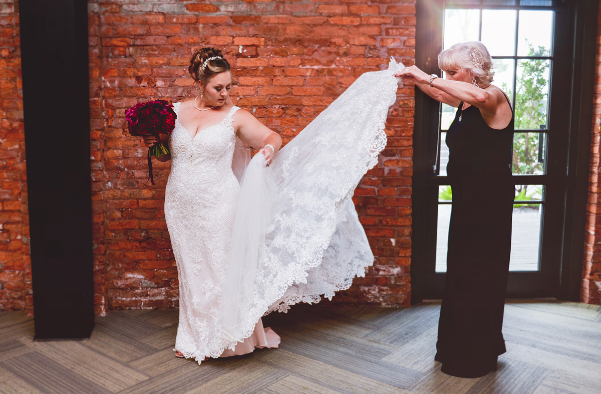 bride, mother of the bride, wedding dress, getting ready, brick, window