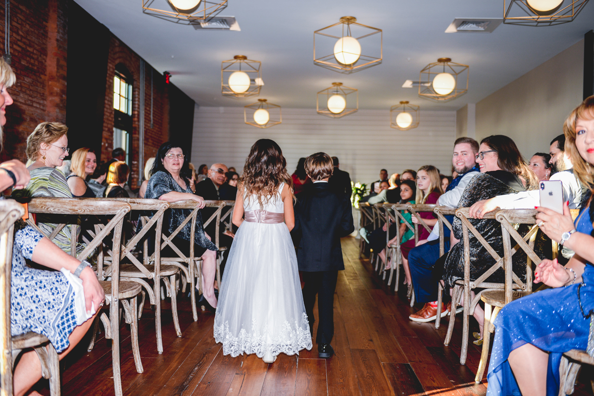 flower girl, ring bearer, walking down the isle, lights 