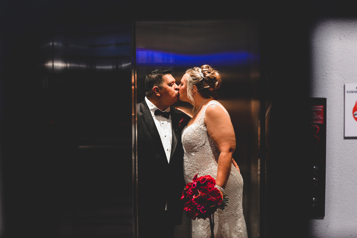 elevator, just married, metal, bride, groom, bouquet 