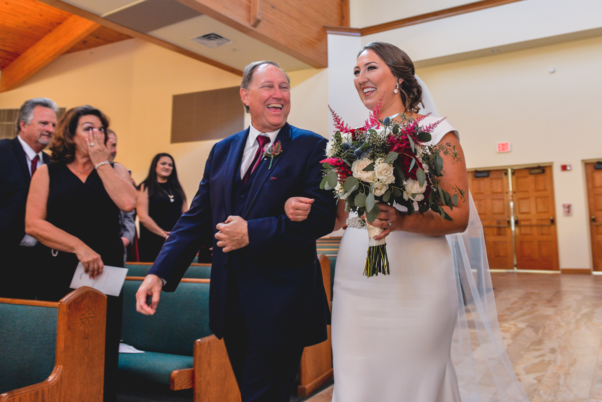 father, daughter, walking, isle, wedding, laughing