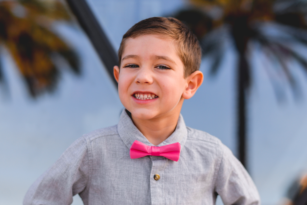 portrait, glass, reflection, palm trees, bow tie