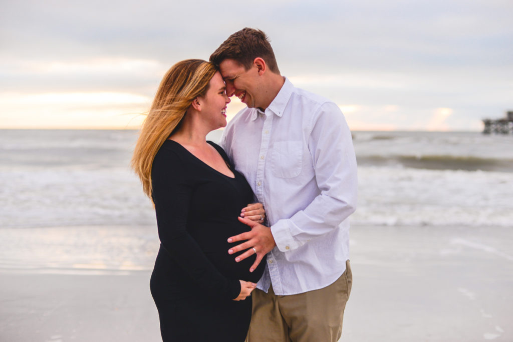 couple, ocean, waves, belly, baby bump, laughing, love