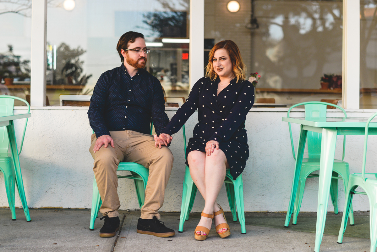 holding hands, window, blue chair, lighting