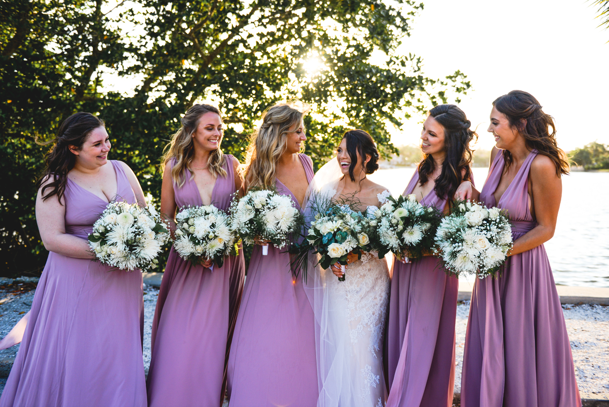 bride, bridesmaids, girlfriends, laughing, dresses