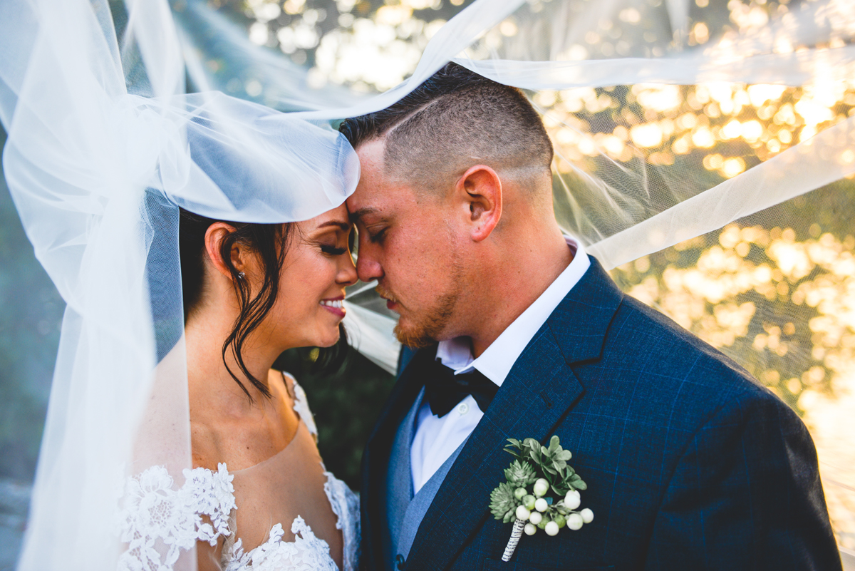 bride, groom, sunset, veil, just married, bokeh 