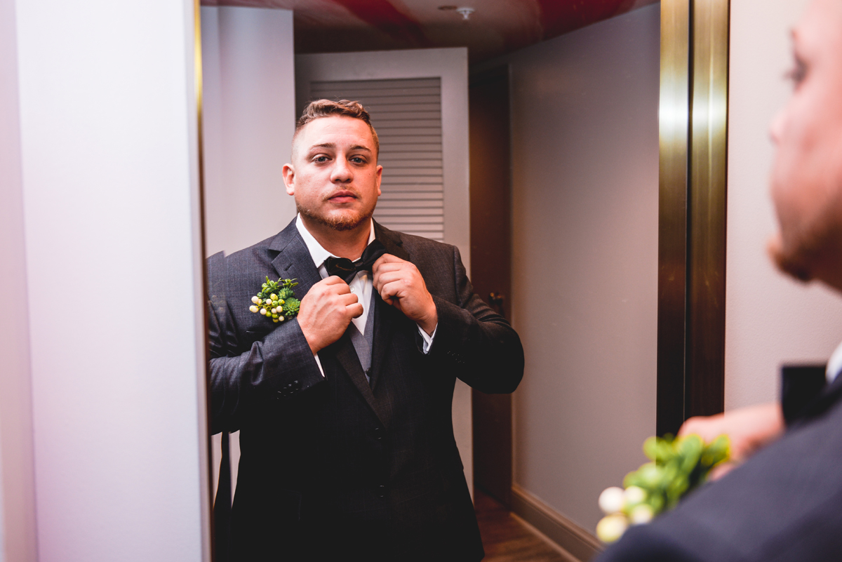 getting ready, groom, suit, bow tie, mirror