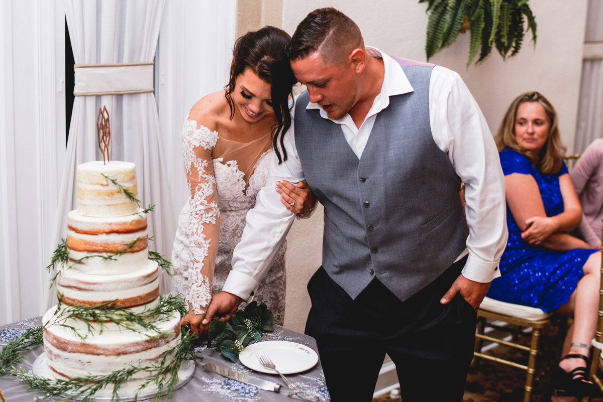 cake cutting, bride, groom, wedding