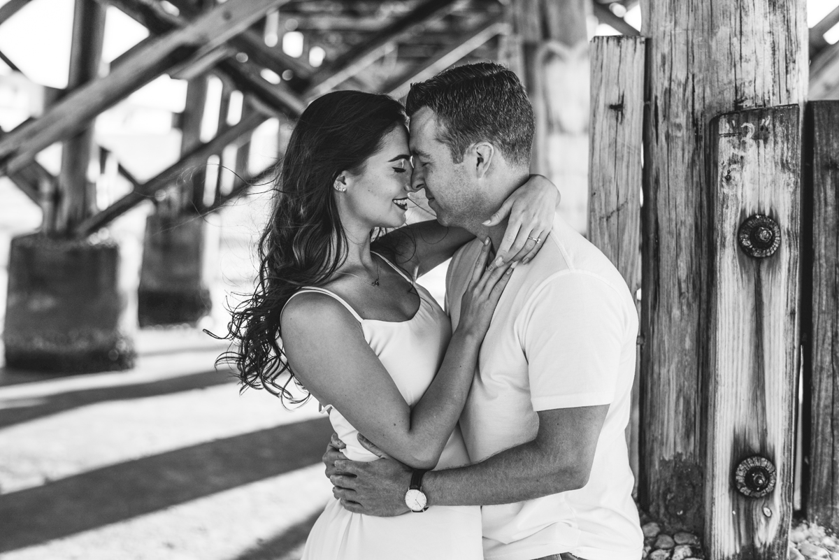 black and white, portrait, shadows, pier, ocean