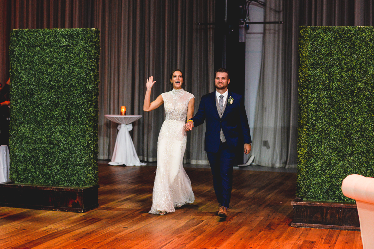 bride, groom, greenery, wood, waving, happy