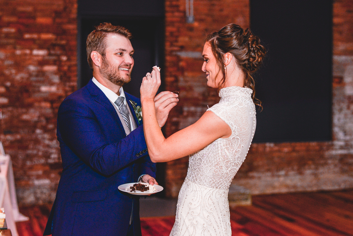 couple, wedding, cake, feeding, laughing, silly