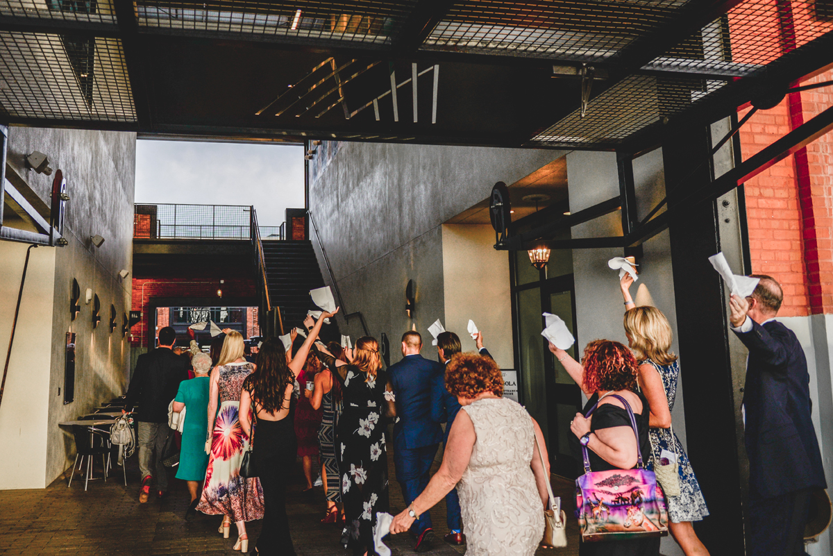 wedding guests, parade, marching, napkins, celebrating