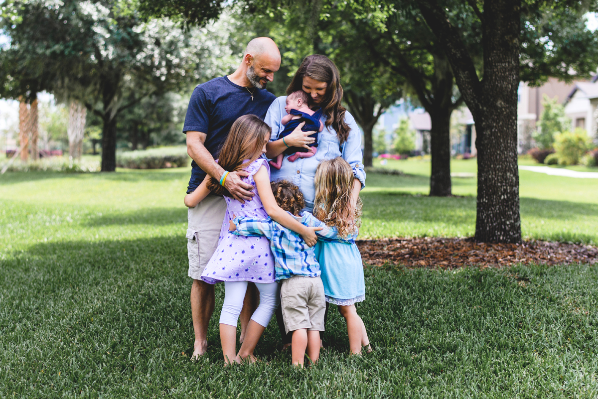 family, park, outside, siblings, grass, hugs