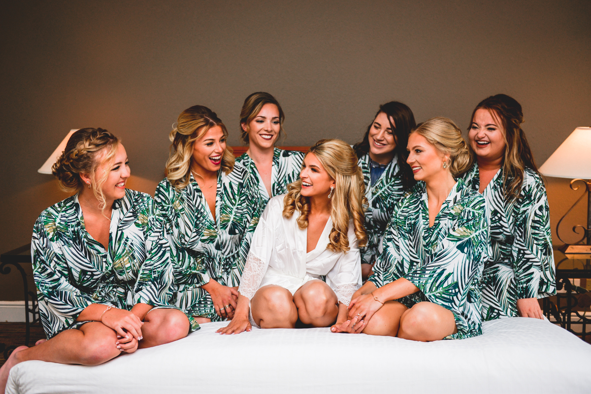 bride, bridesmaids, getting ready, bed, laughing, girlfriends 