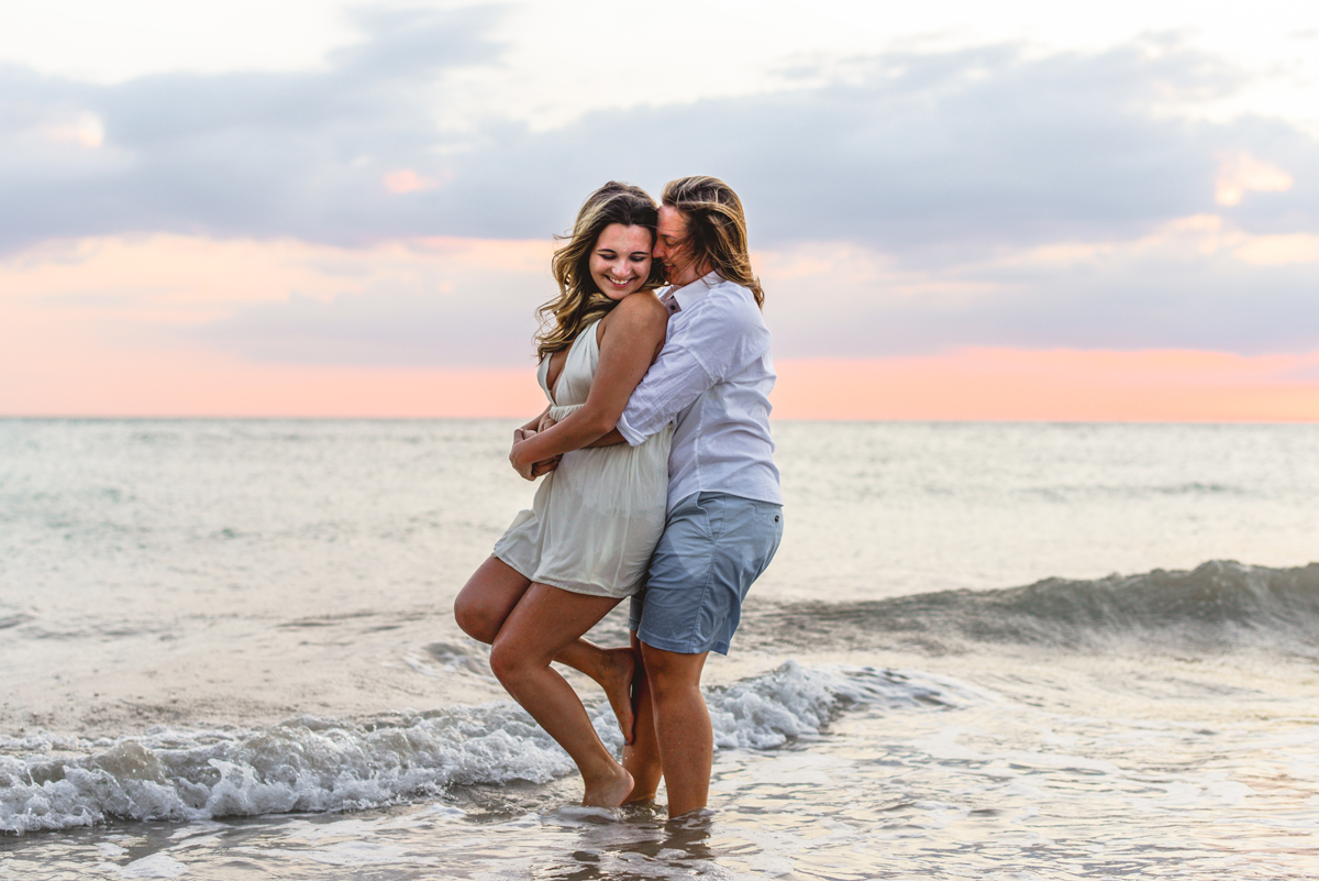 laughing, playing, ocean, water, sunset