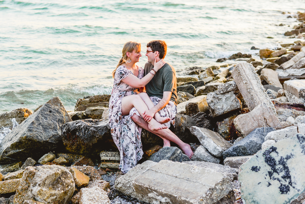 couple, rocks, ocean, dress