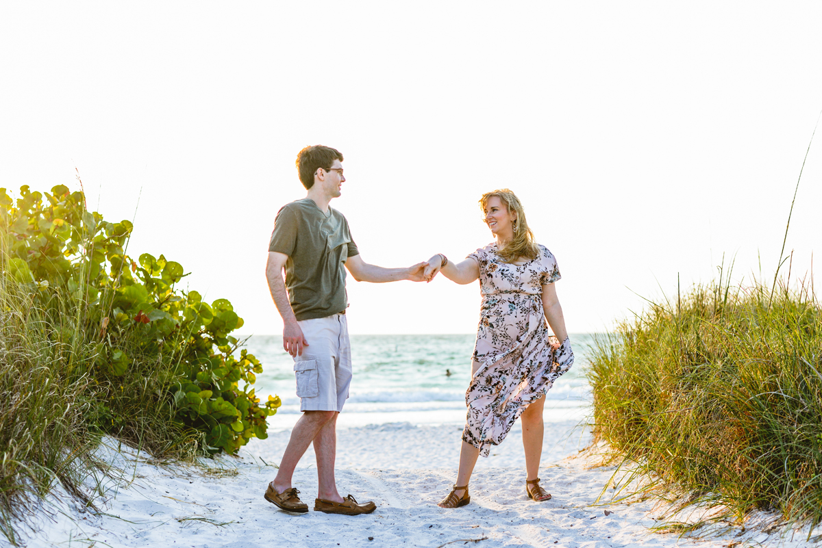 couple, beach, ocean sea grapes, dancing