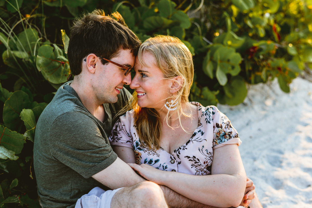 sand, beach, greenery, couple hugging