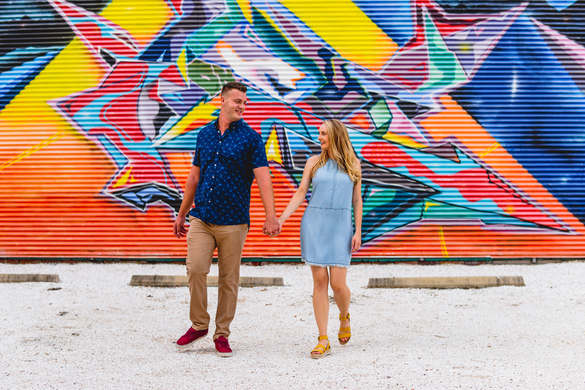 couple, holding hands, mural, colorful